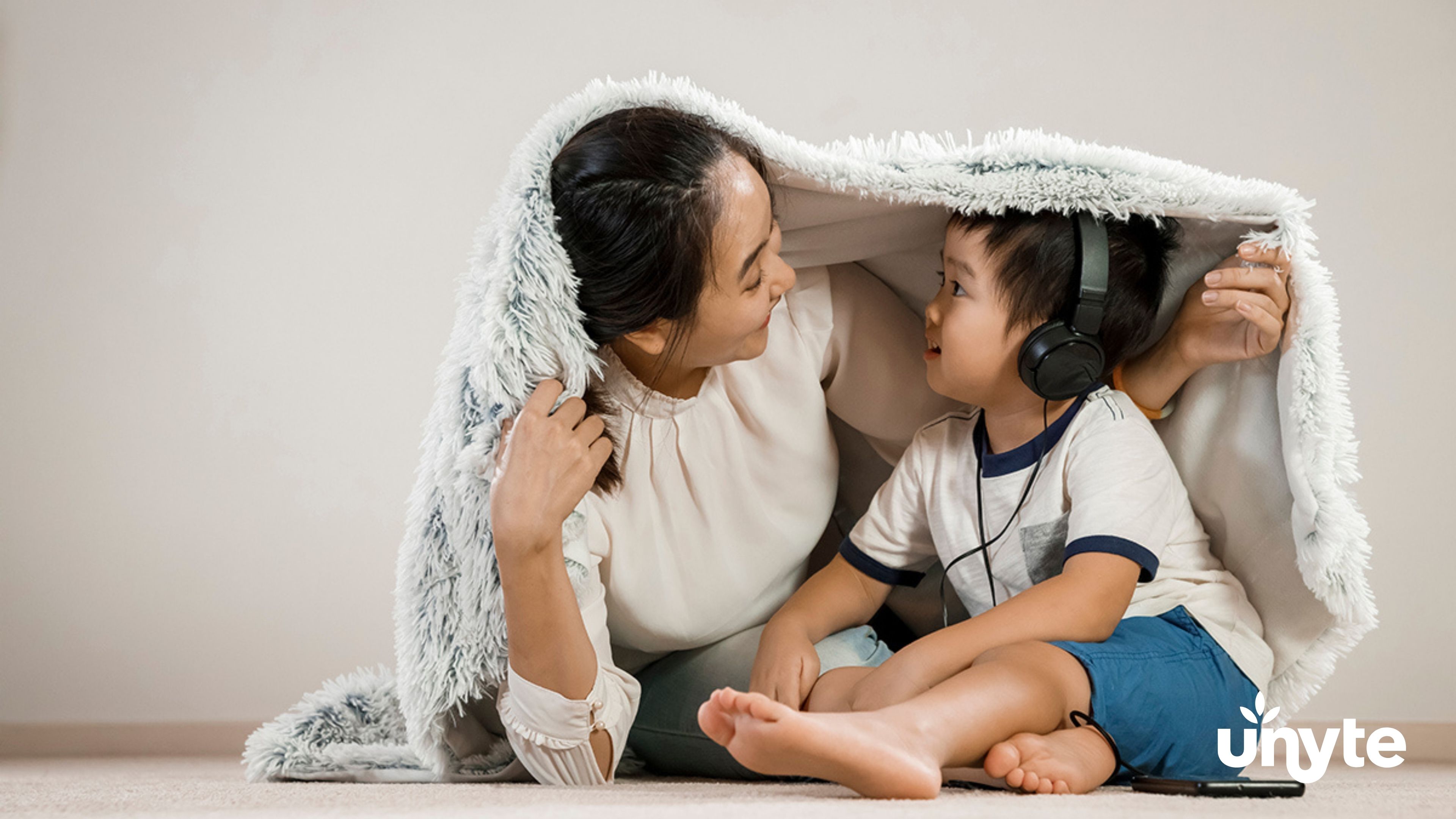 Mother and child sharing a calm moment during SSP listening therapy